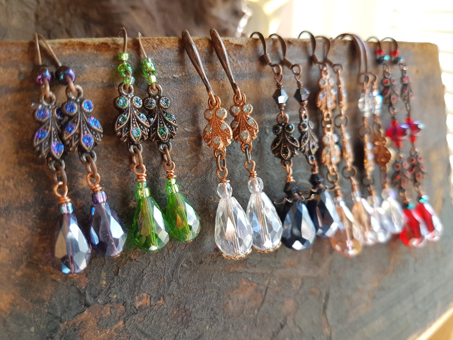 Crystal clear drop earrings with flower bead cap